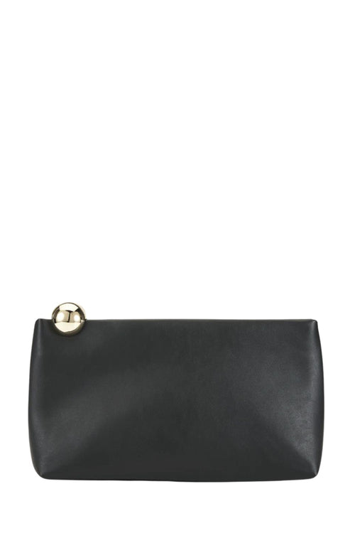 A black leather clutch bag with a gold-tone metal button clasp, shown against a plain white background.