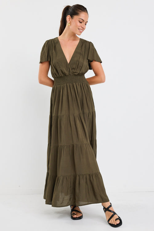 model wears a khaki maxi dress