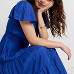 model wears Blue Shirred Maxi Dress