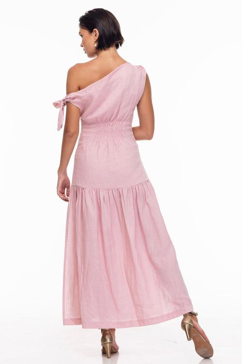 model wears a pink one shoulder maxi dress