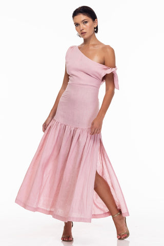 model wears a pink one shoulder maxi dress