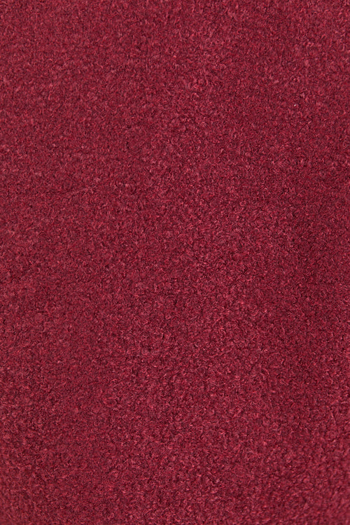 Close up of burgundy textured fabric