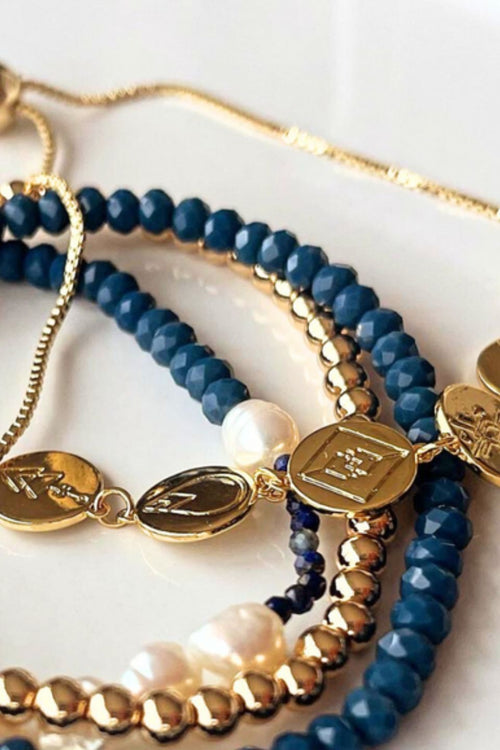 gold bracelet layered