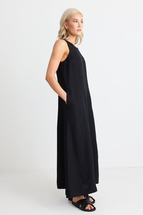 Model wears maxi linen black dress