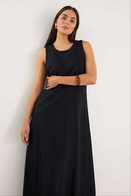 model wearing long black linen dress