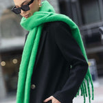 model wears a green scarf