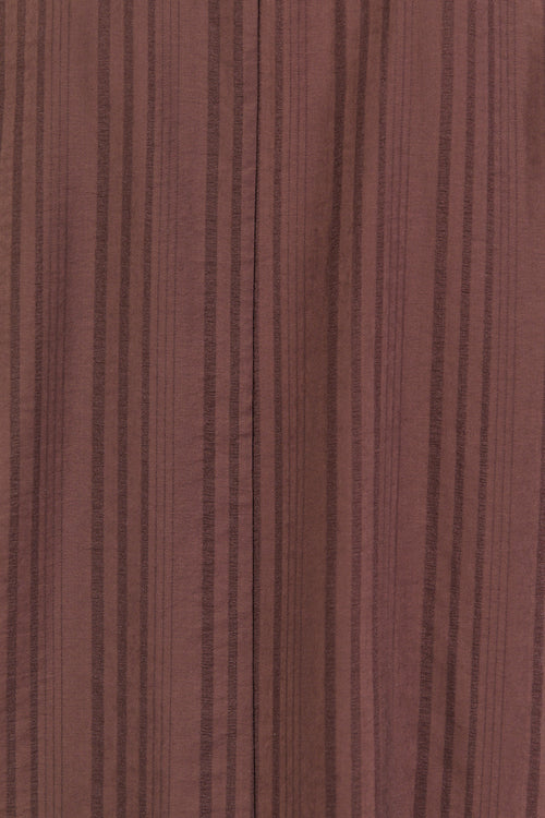 Brown fabric texture with vertical stripes