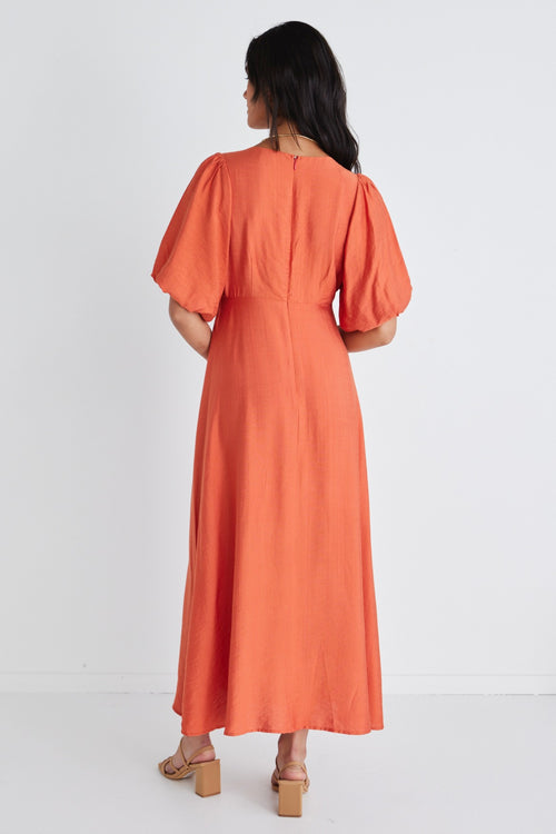 Model wears Orange Puff Sleeve Midi Dress