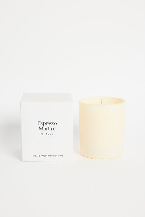 Candle labeled 'Espresso Martini' by Ben Agastya with packaging on a white background