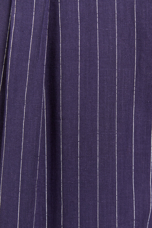 Close up of navy shirt with white stripes fabric texture.