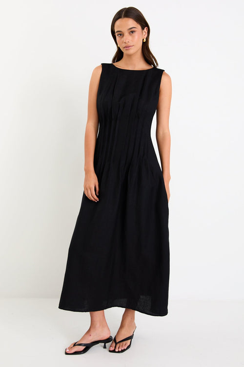 Woman wearing a black linen dress 