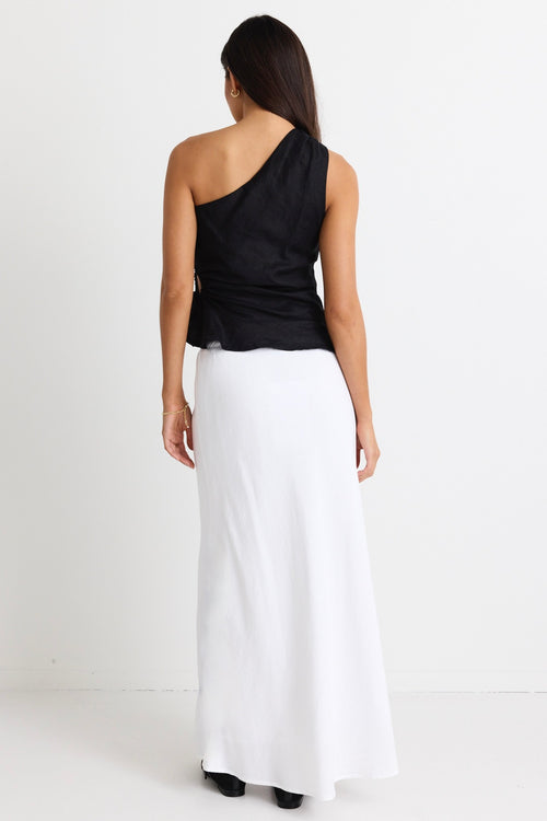 model wears a one shoulder black linen top