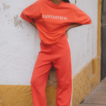 model wears red oversized tee shirt