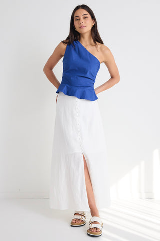 model wears white cotton linen midi skirt and blue top