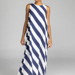 model wearing a navy and white striped maxi dress
