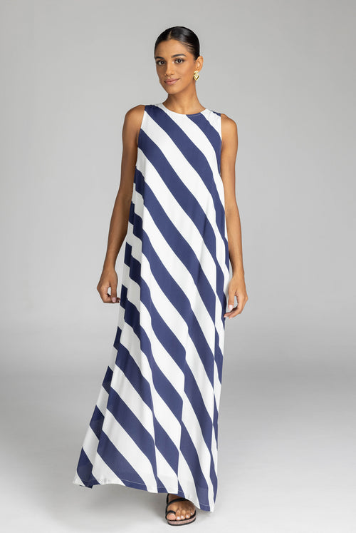 model wearing a navy and white striped maxi dress