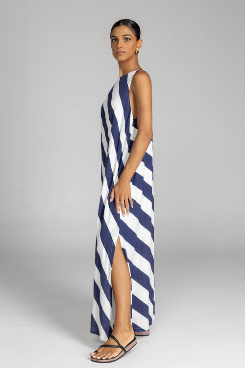 model wearing a navy and white striped maxi dress