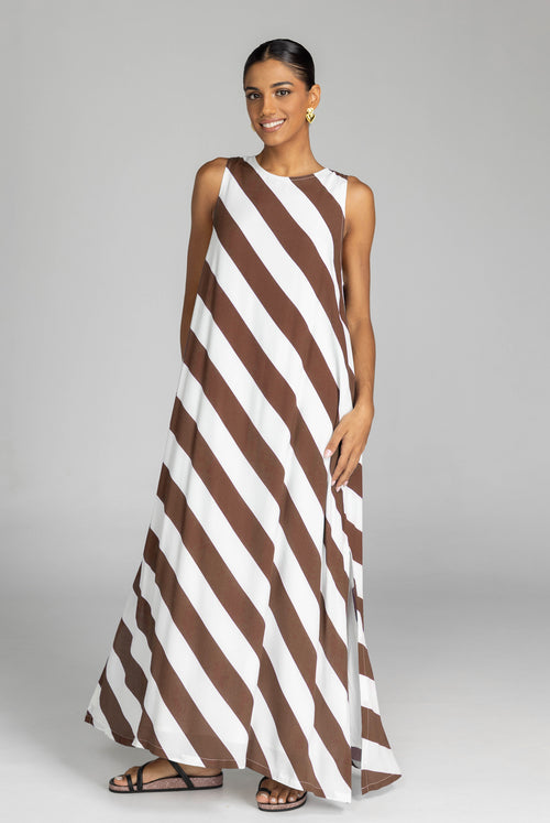 model wearing chocolate and white striped maxi dress