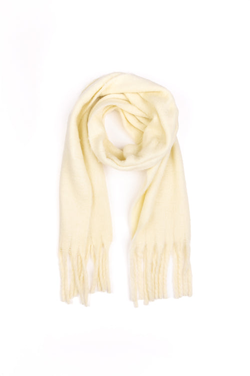 Lemon yellow coloured scarf on a white background