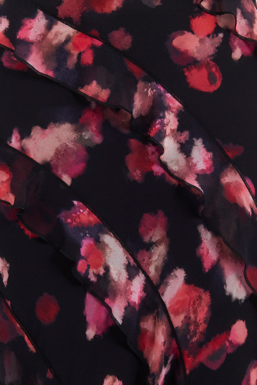 Close-up of fabric with a floral pattern on a dark background