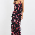 Woman wearing a floral dress on a white background