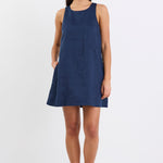 Woman wearing a blue dress on a white background