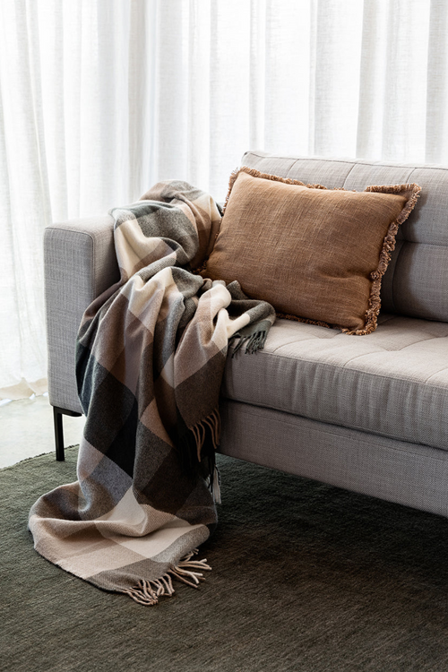 plaid blanket throw on couch