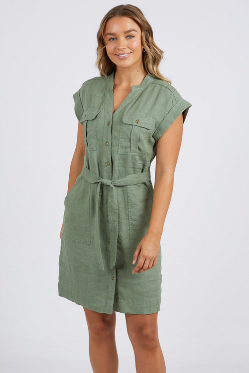 model wears green linen mini dress