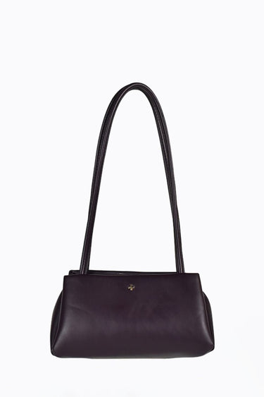 A dark chocolate leather shoulder bag with a single long strap and a small gold logo on the front, set against a plain white background.
