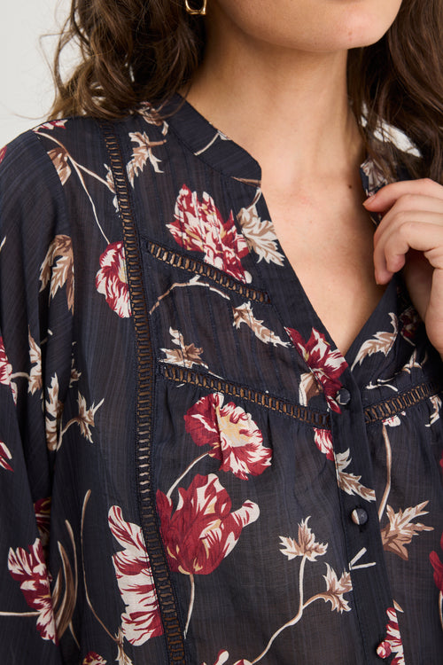 Floral patterned garment with a deep neckline