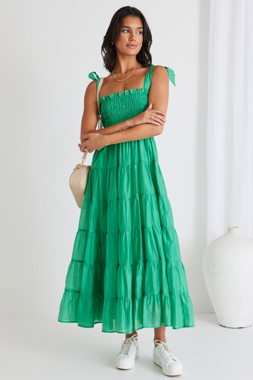 model wears green cotton maxi dress