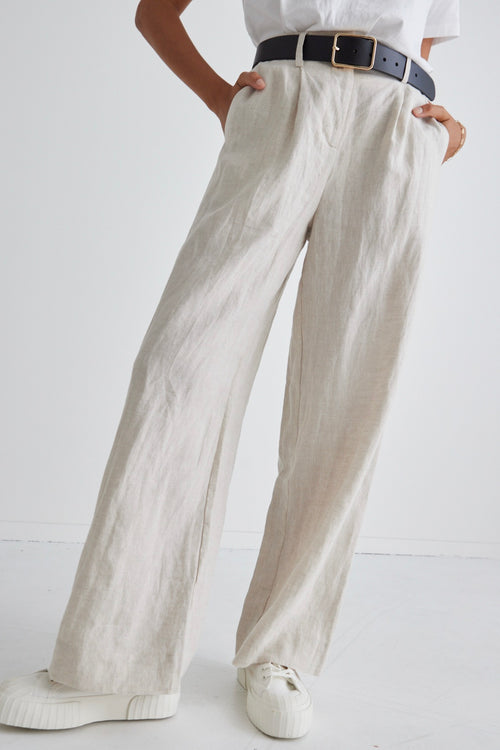 model wears a beige linen pant