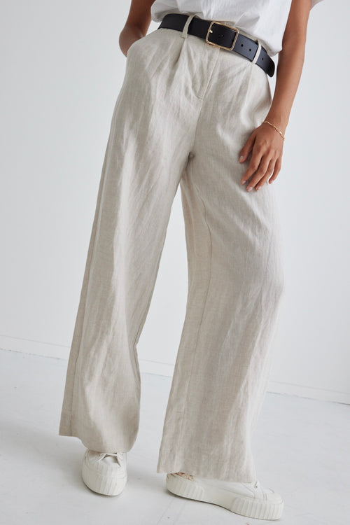 model wears a beige linen pant