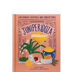 Book titled 'Juniperiooza' with cocktail illustration on a white background