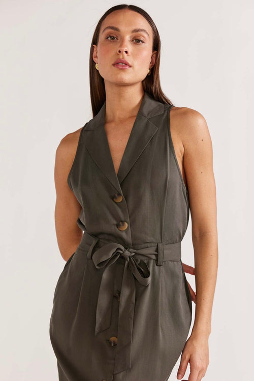 model wears a khaki midi dress