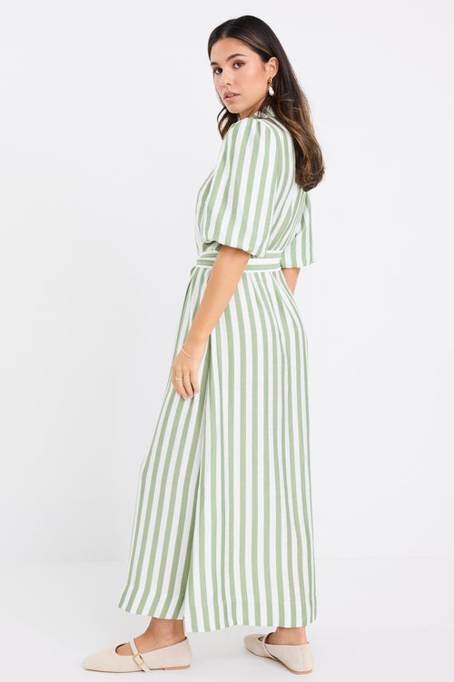 Woman wearing a moss and white striped short sleeve shirt dress with puff sleeves, button front, waist tie and collar