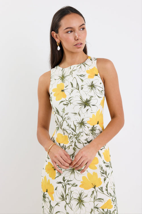 woman wearing buttercup floral dress