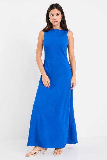 model wears a blue maxi dress