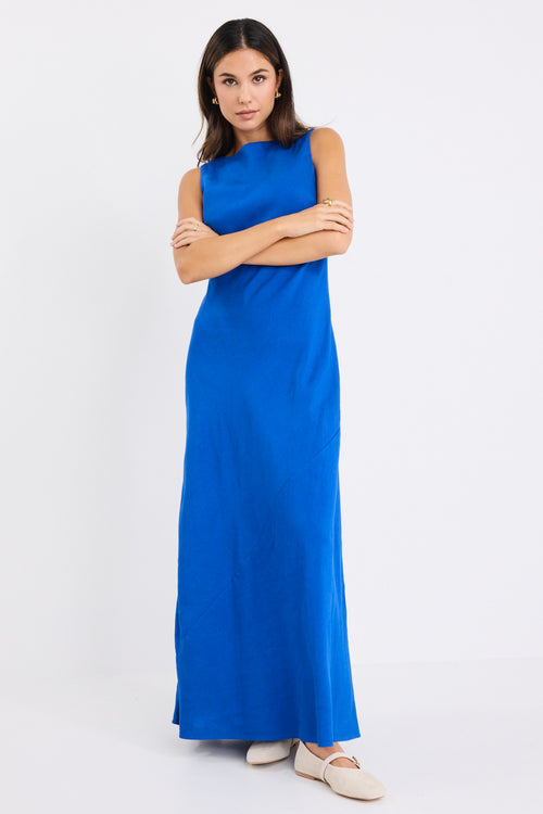 model wears a blue maxi dress