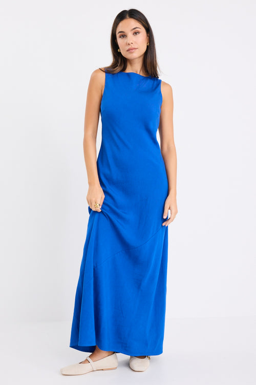 model wears a blue maxi dress