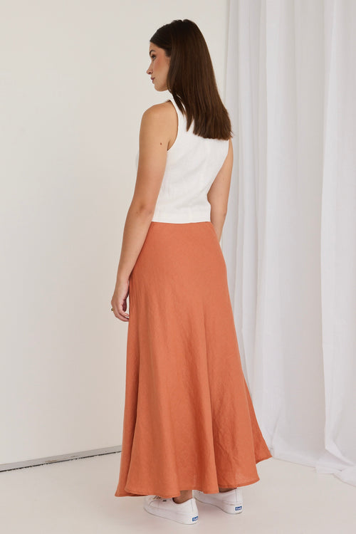 model wears a orange linen skirt