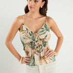 Woman wears a cami top