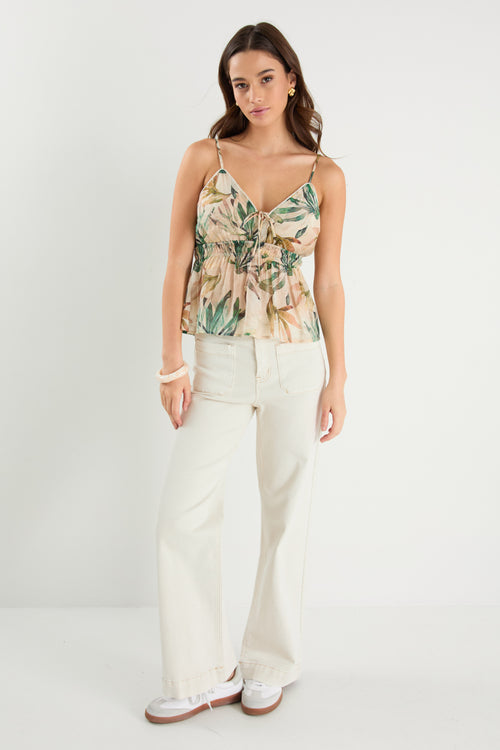 Woman wears a cami top