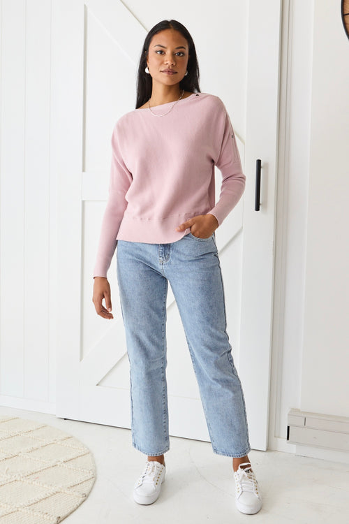 Model wears a pink knit