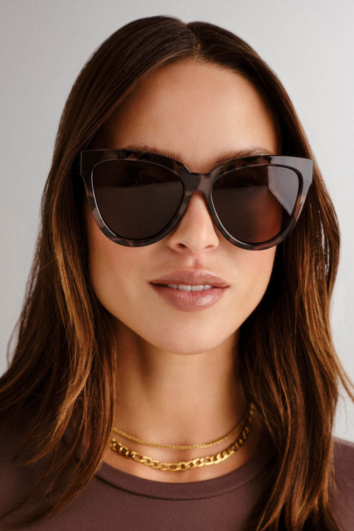 model wears Brown Tort Cateye Sunglasses