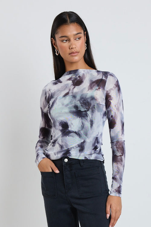 model wears grey smudge print mesh long sleeve top