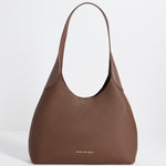 Brown handbag on a white background