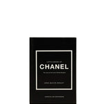 Black book with Chanel branding on a white background