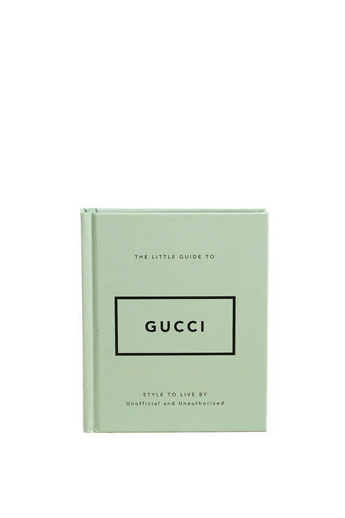 Green book titled 'The Little Guide to Gucci' on a white background