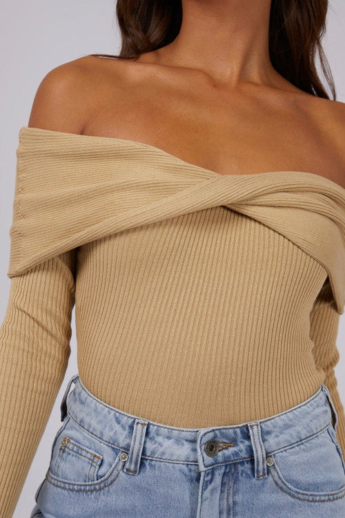 model wears Tan Off Shoulder Knit Top